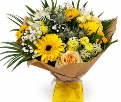 Sunshine - A cheerful hand-tied bouquet in vibrant yellow, cream and fresh green tones, beautifully arranged to brighten birthdays, celebrations or simply someone's day.