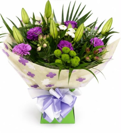 Midnight - A beautifully hand-tied bouquet in fresh white, purple and green tones, carefully arranged to bring elegance and charm to any occasion.