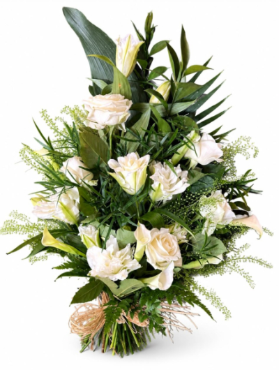 Heaven Scents - A front-facing bouquet in crisp white tones, thoughtfully arranged to offer a timeless expression of love, sympathy, and remembrance.