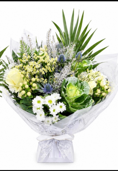 Winter Blizzard - A stunning hand-tied bouquet of seasonal flowers, with a mixture of greenery and white flowers.